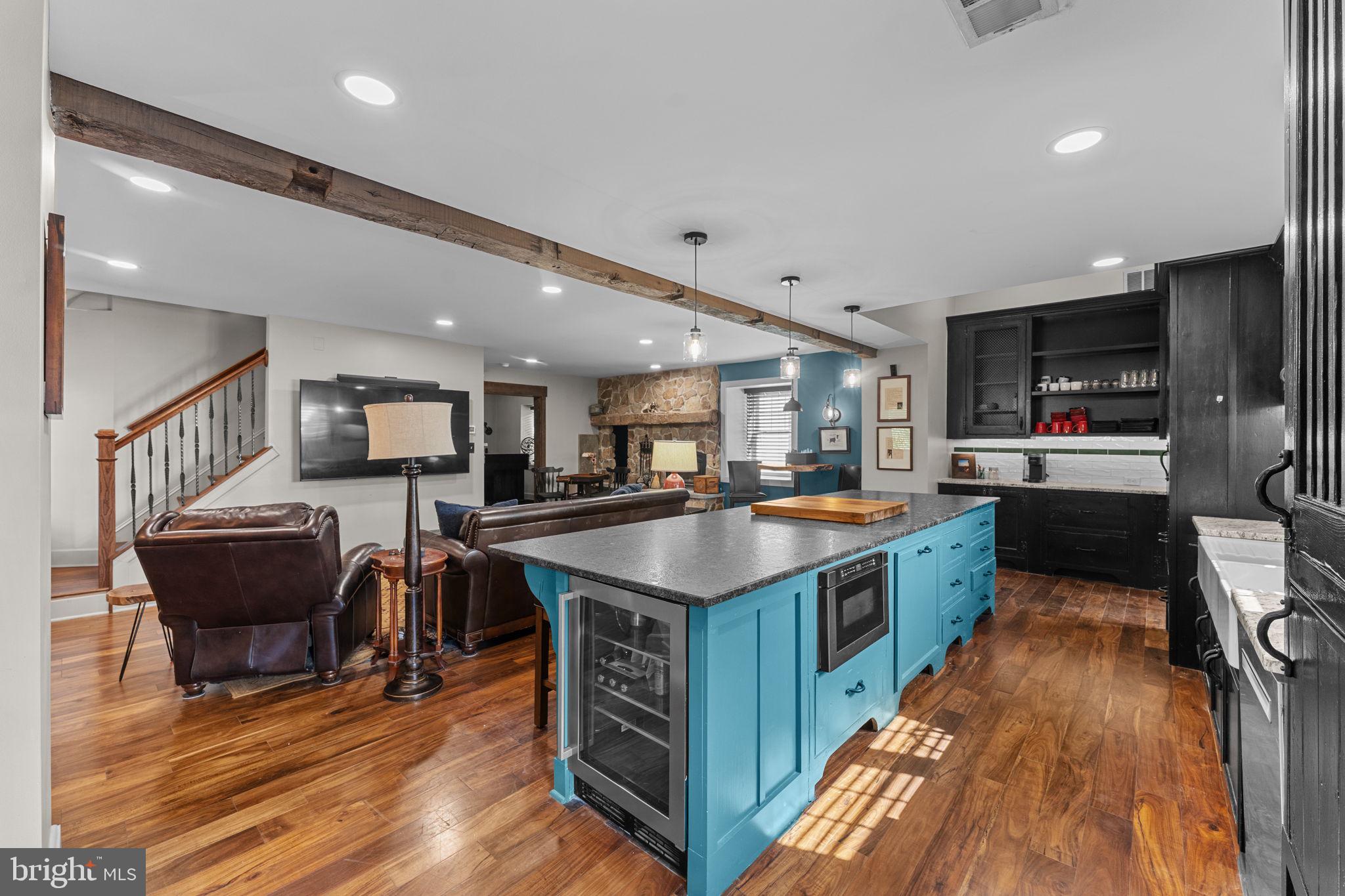 10 Arlington Road Malvern, PA 19355 - Photo 17 of 38 a kitchen with stainless steel appliances granite countertop a sink a stove and a refrigerator