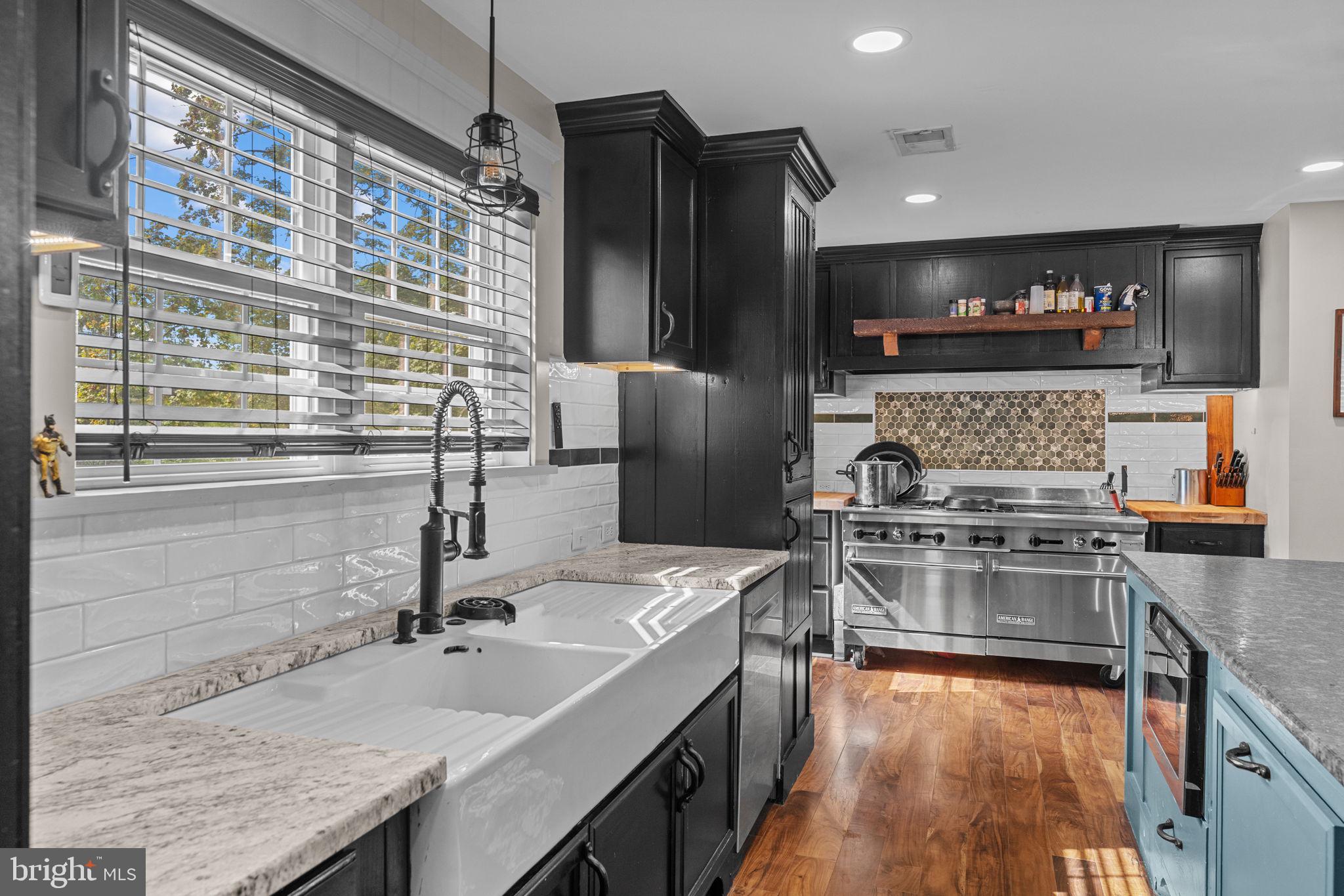 10 Arlington Road Malvern, PA 19355 - Photo 18 of 38 a kitchen with a sink stove and refrigerator