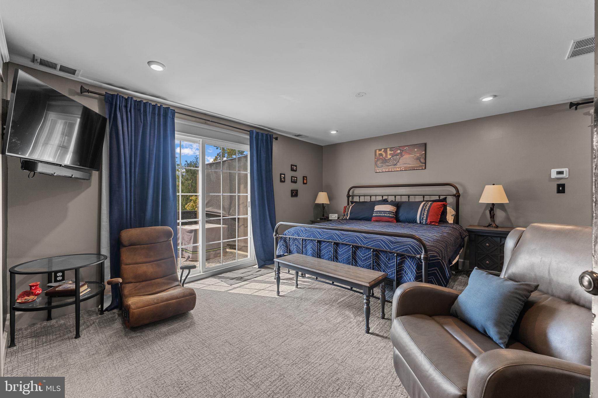 10 Arlington Road Malvern, PA 19355 - Photo 22 of 38 a bedroom with furniture and a window