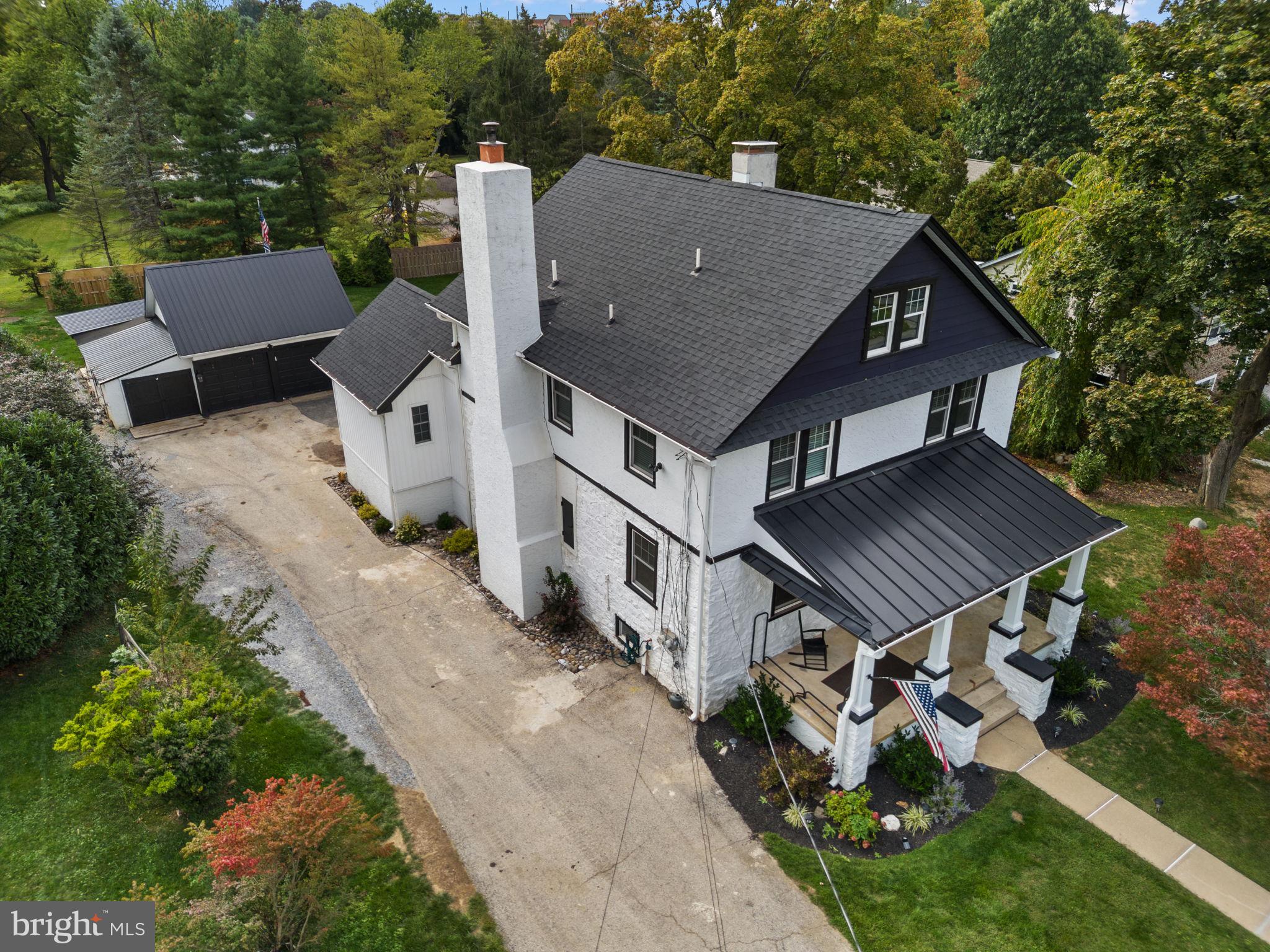 10 Arlington Road Malvern, PA 19355 - Photo 3 of 38 an aerial view of a house with a yard