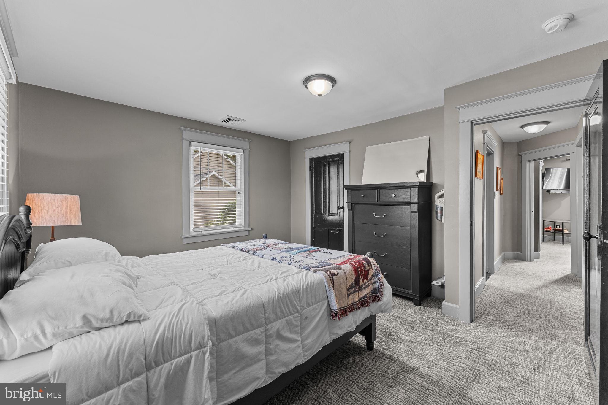 10 Arlington Road Malvern, PA 19355 - Photo 31 of 38 a bedroom with a bed and a dresser