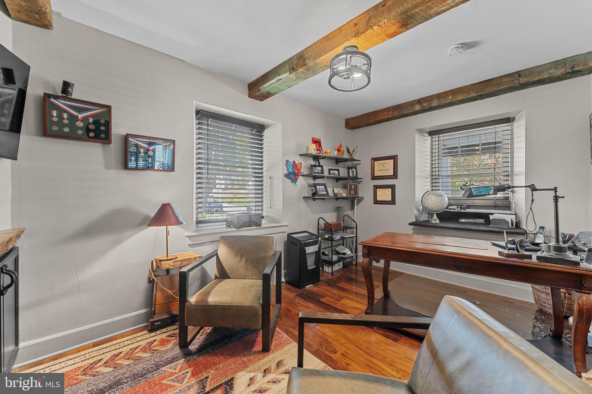 10 Arlington Road Malvern, PA 19355 - Photo 8 of 38 a work room with furniture and windows