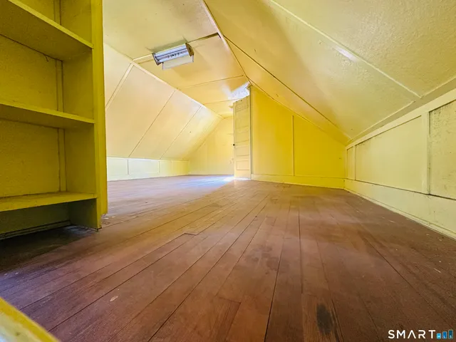 a view of a big room with wooden floor