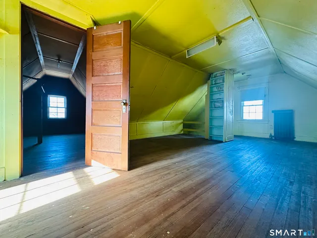 a view of outdoor space and wooden floor