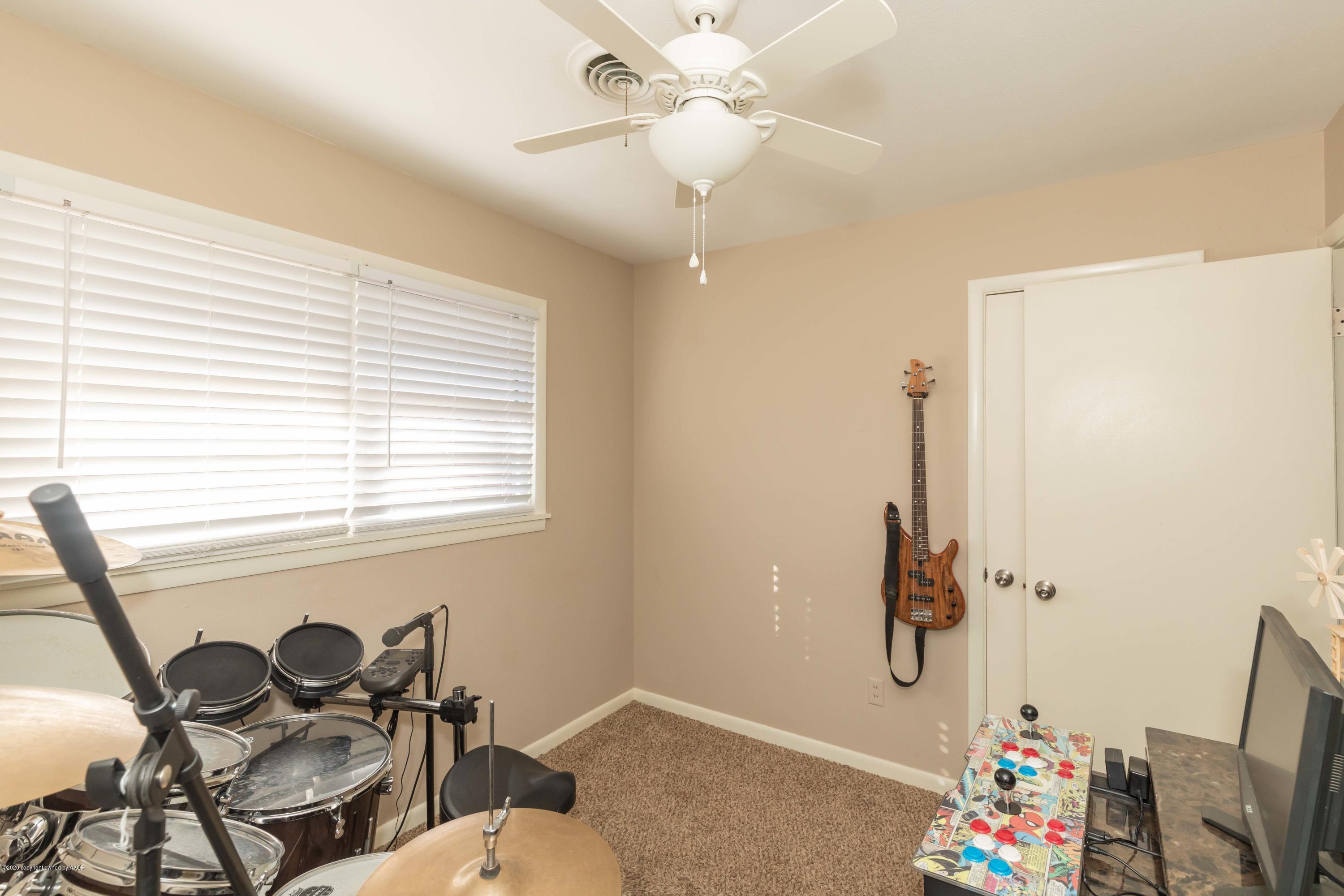 4712 South Bryan Street Amarillo, TX 79110 - Photo 26 of 36 a view of a room with gym equipment