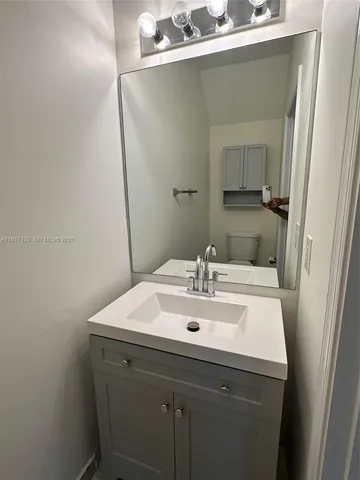 a view of outdoor space with wooden fence