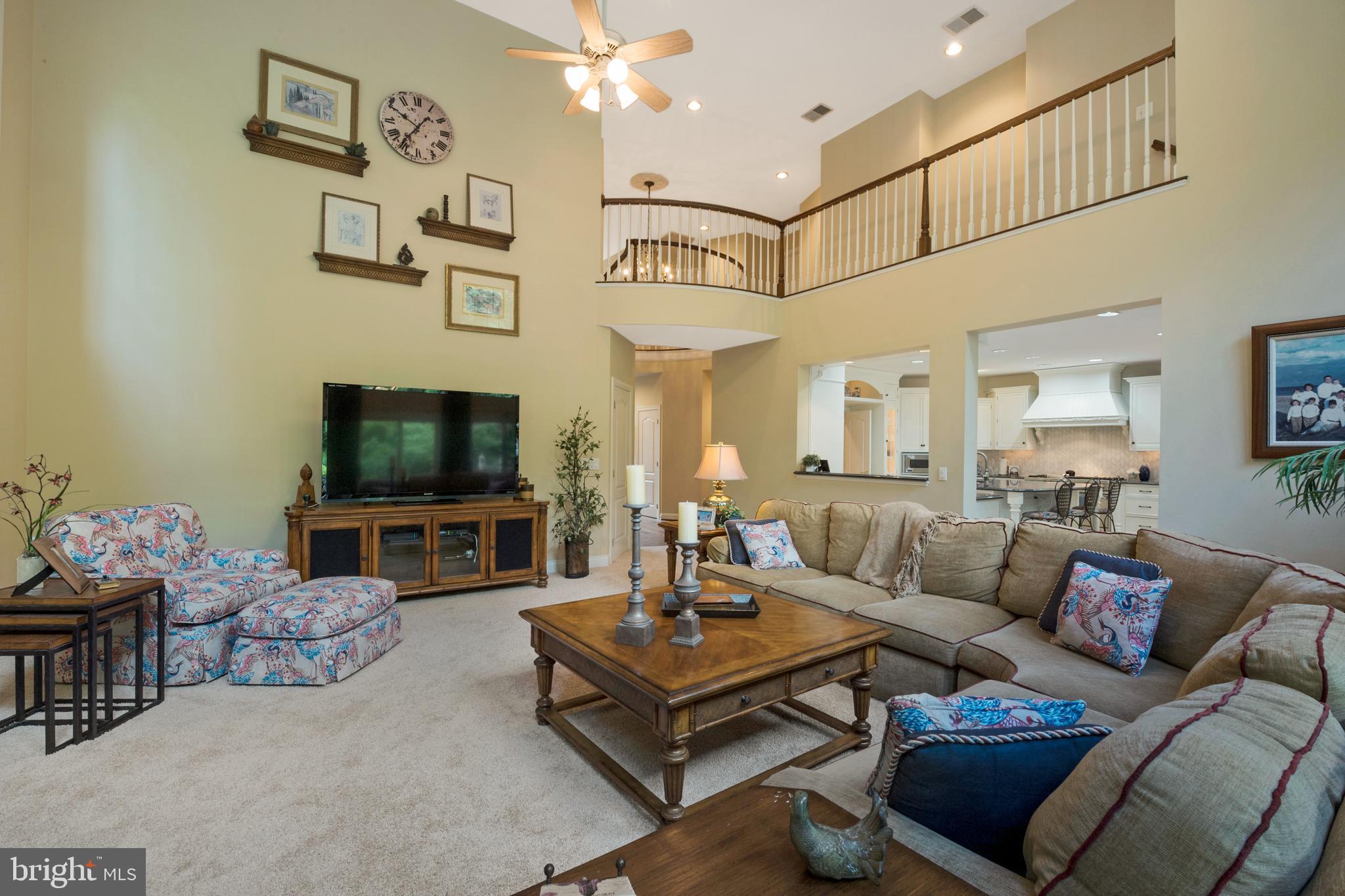 201 Morning Cloak Row Edgewater, MD 21037 - Photo 10 of 75 Spacious yet cozy family room opens to kitchen