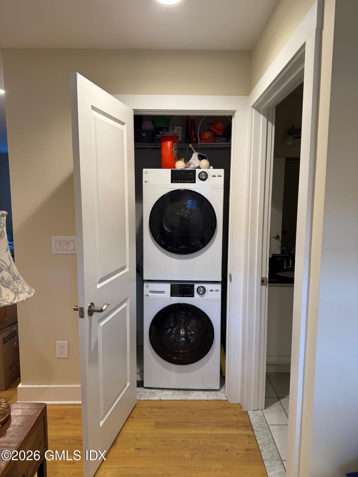 180 Hamilton Avenue, Unit C Greenwich, CT 06830 - Photo 8 of 15 a view of a hallway with washer and dryer