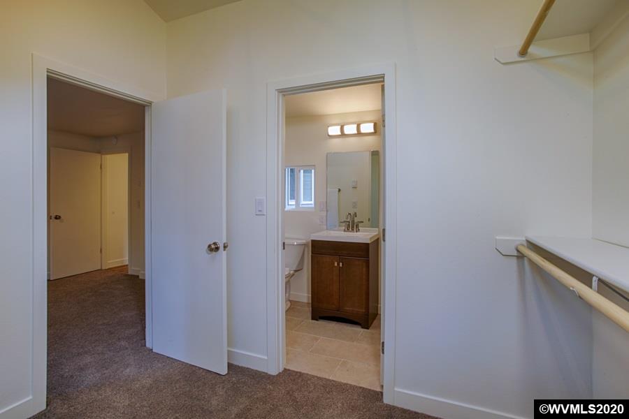 3245 Mistletoe Road Dallas, OR 97338 - Photo 21 of 28 a view of bathroom with a sink and mirror