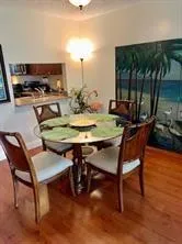 a view of a workspace with furniture