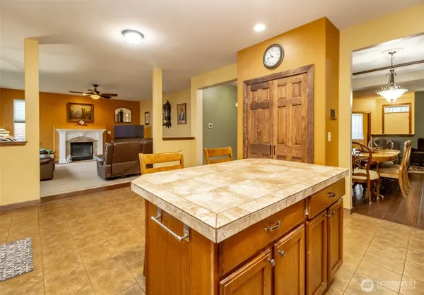 a kitchen with stainless steel appliances granite countertop a sink and cabinets