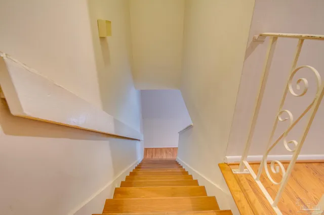 a view of balcony with wooden floor