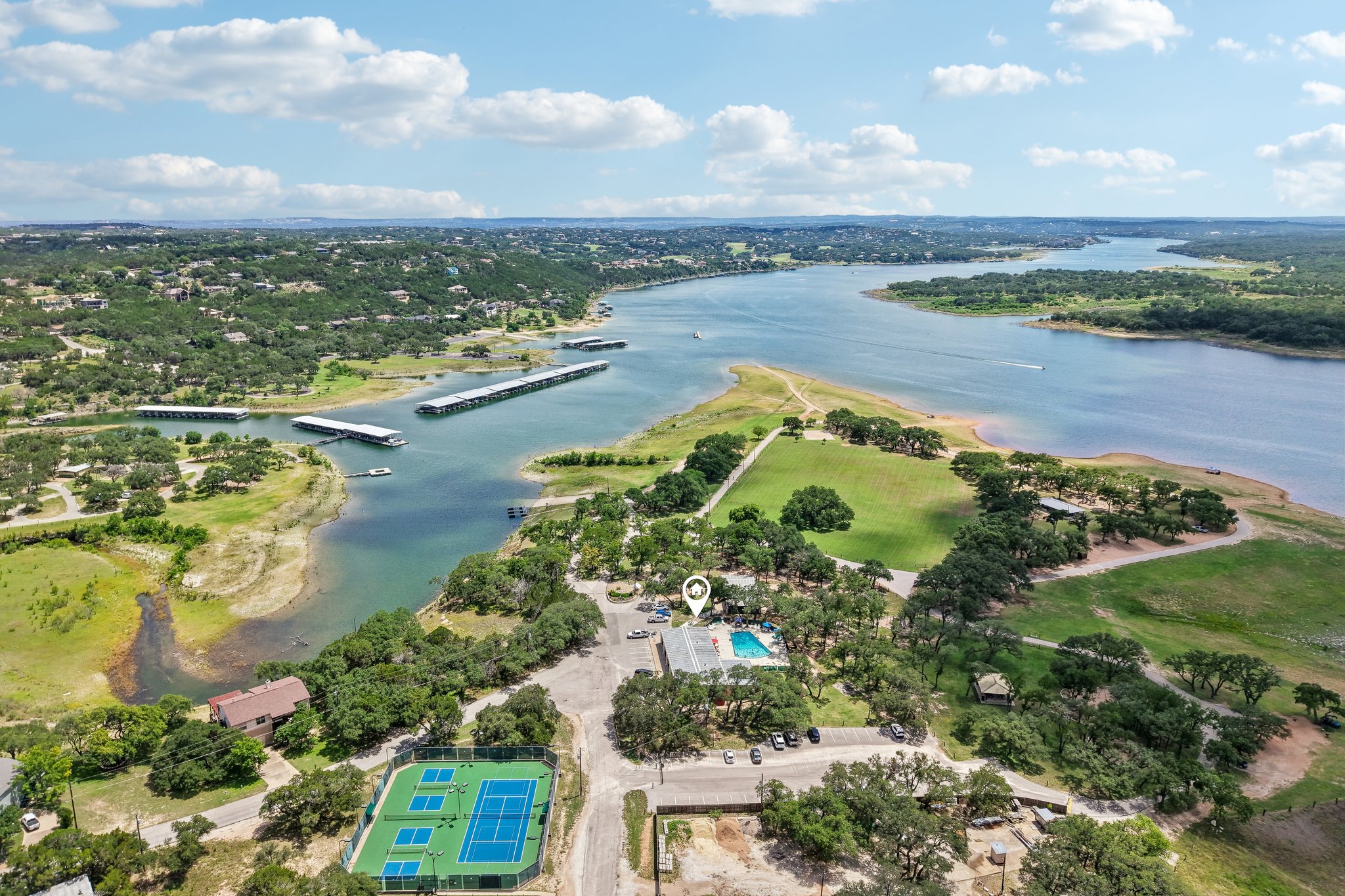 20609 Bridle Path Road Lago Vista, TX 78645 - Photo 30 of 30 Overlooking the lake, this community boasts waterfront access, multiple boat docks, and recreational courts.