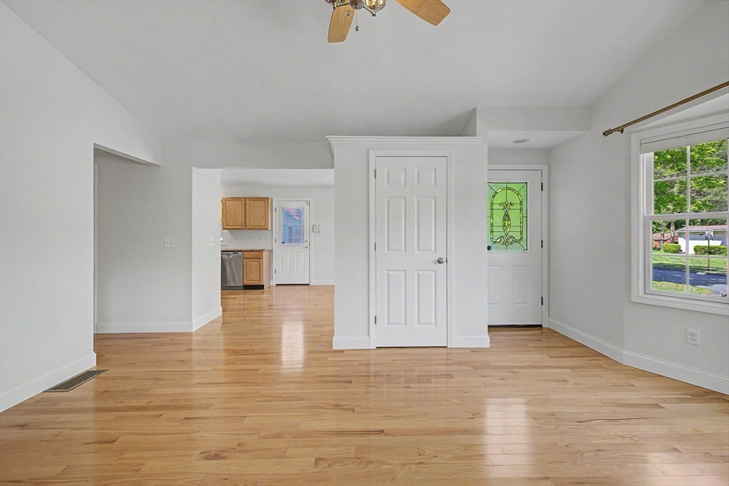 792 Ryan Road Northampton, MA 01062 - Photo 12 of 29 a view of empty room with wooden floor and window