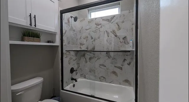 a house that has a big yard plants and big trees