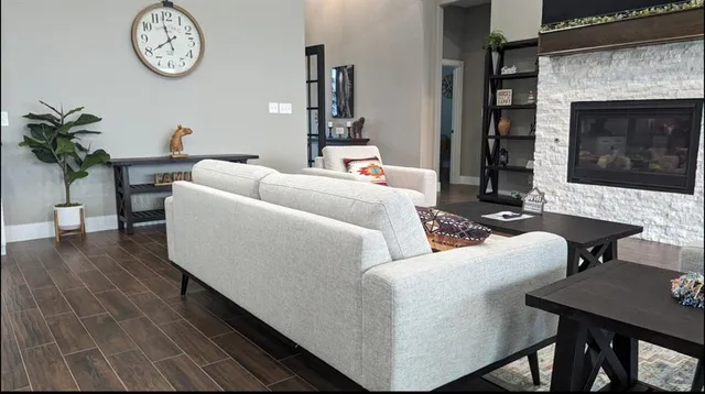 a kitchen with lots of counter top space and wooden floor