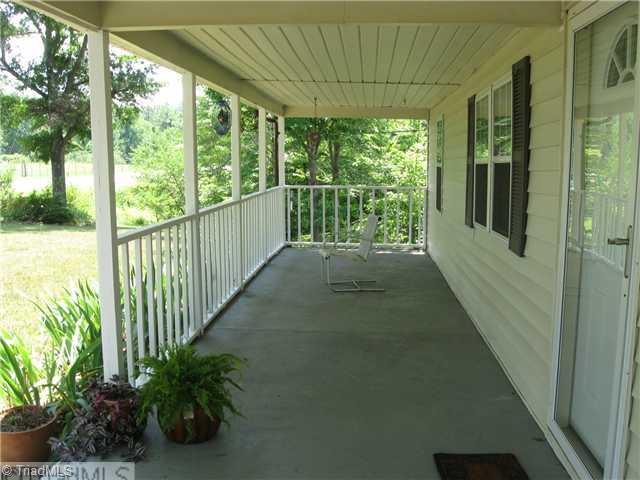 2000 Gold Hill Road Madison, NC 27025 - Photo 11 of 16 Other. Covered Rocking Chair Front Porch