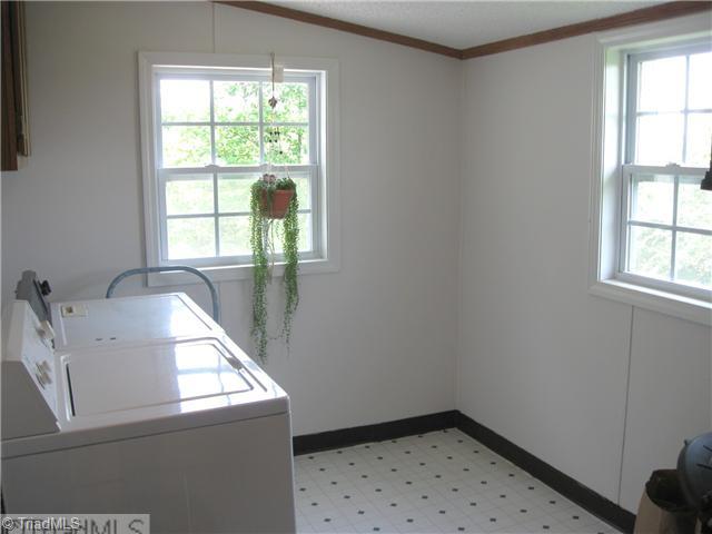 2000 Gold Hill Road Madison, NC 27025 - Photo 9 of 16 Enclosed Porch. Enclosed Porch/Laundry Room