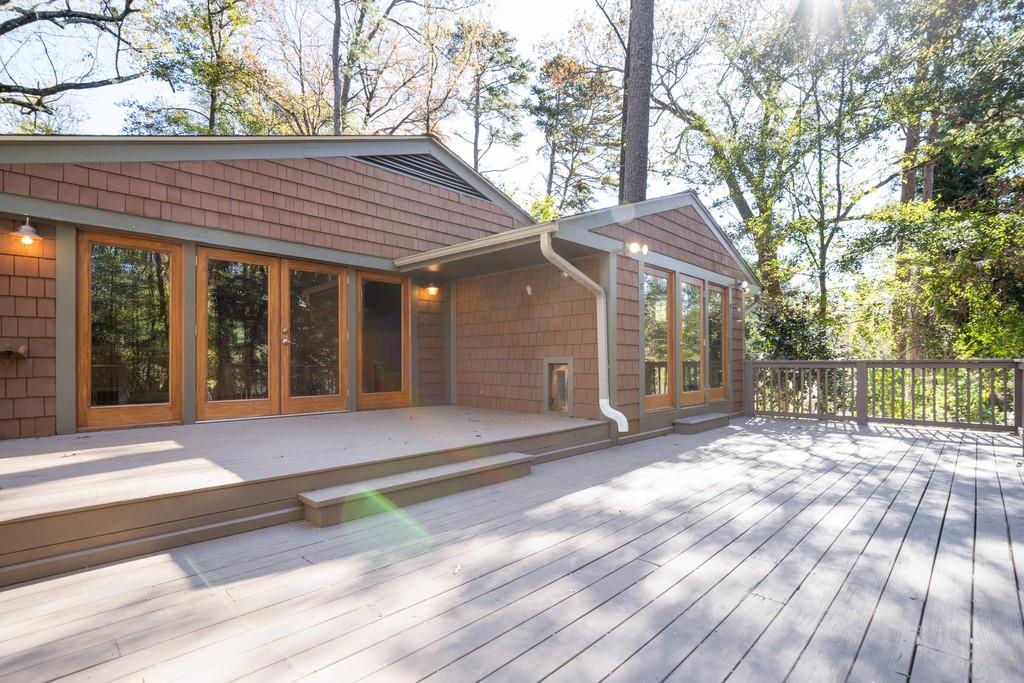 Enjoy the crisp weather on the expansive deck in the private backyard