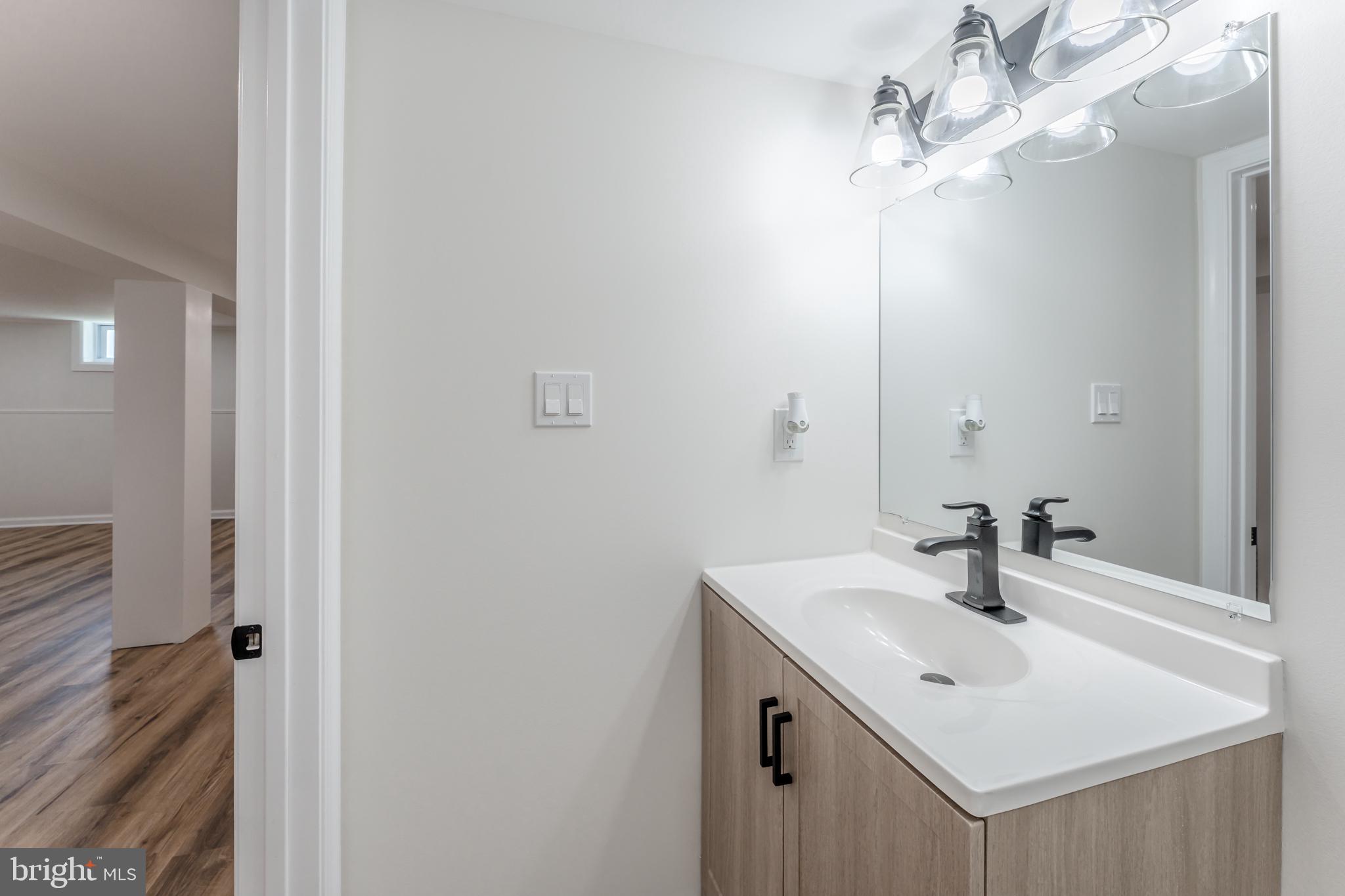 955 Bridge Road Collegeville, PA 19426 - Photo 52 of 71 Sleek modern bathroom with natural light.