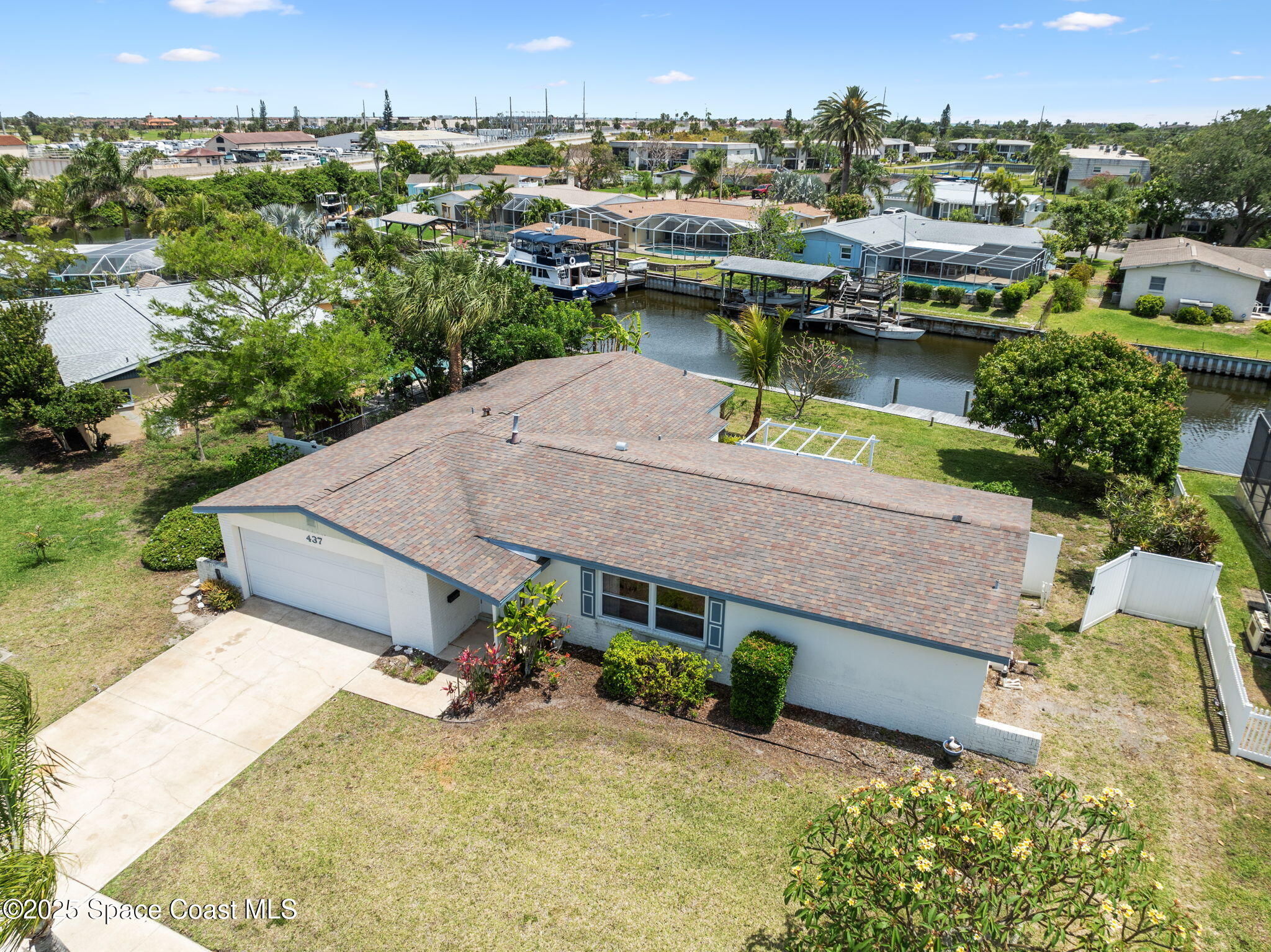 437 Eagle Drive Satellite Beach, FL 32937 - Photo 1 of 30 an aerial view of a house with a yard basket ball court and outdoor seating