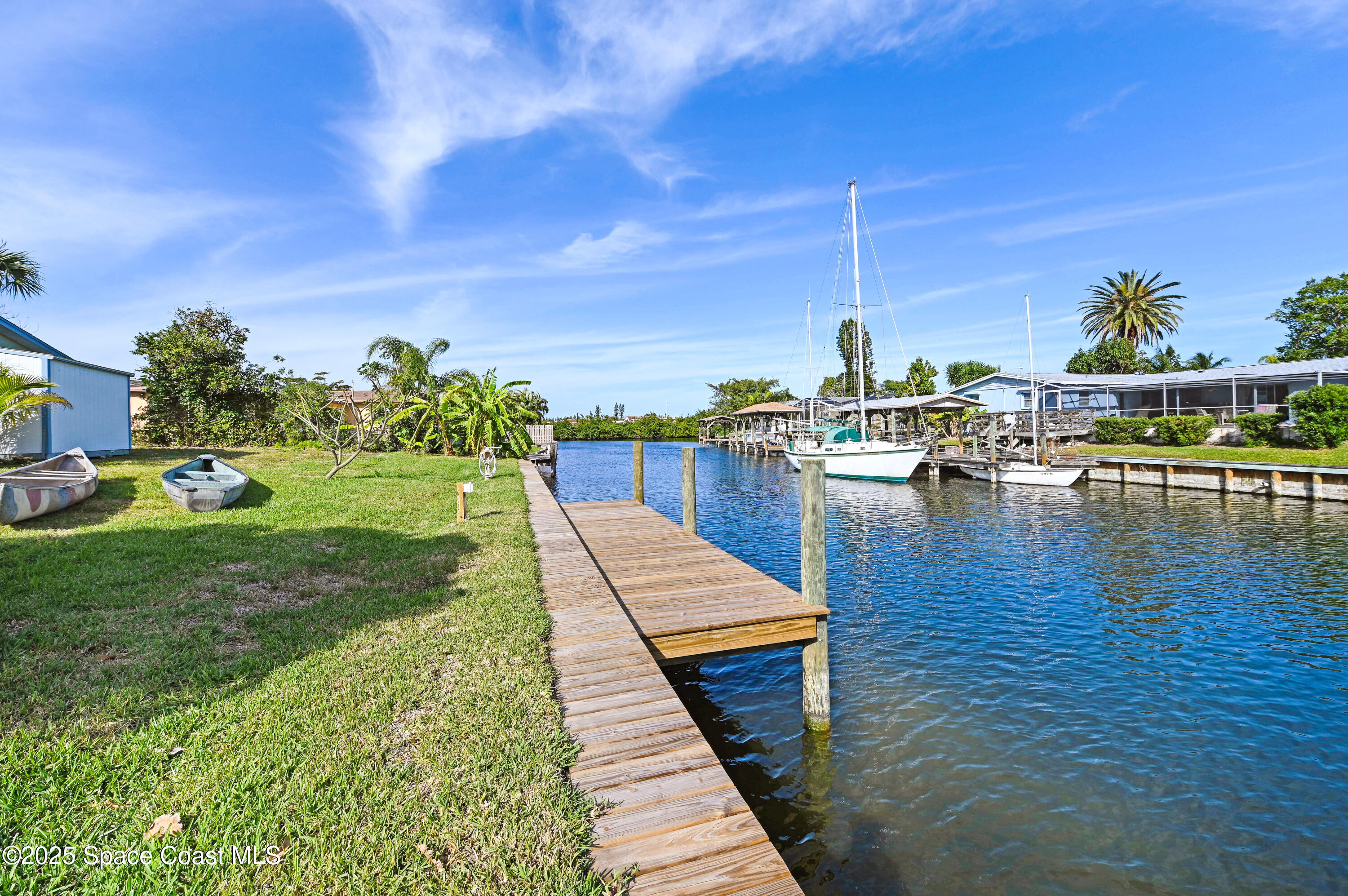437 Eagle Drive Satellite Beach, FL 32937 - Photo 13 of 30 a view of a lake with sitting area