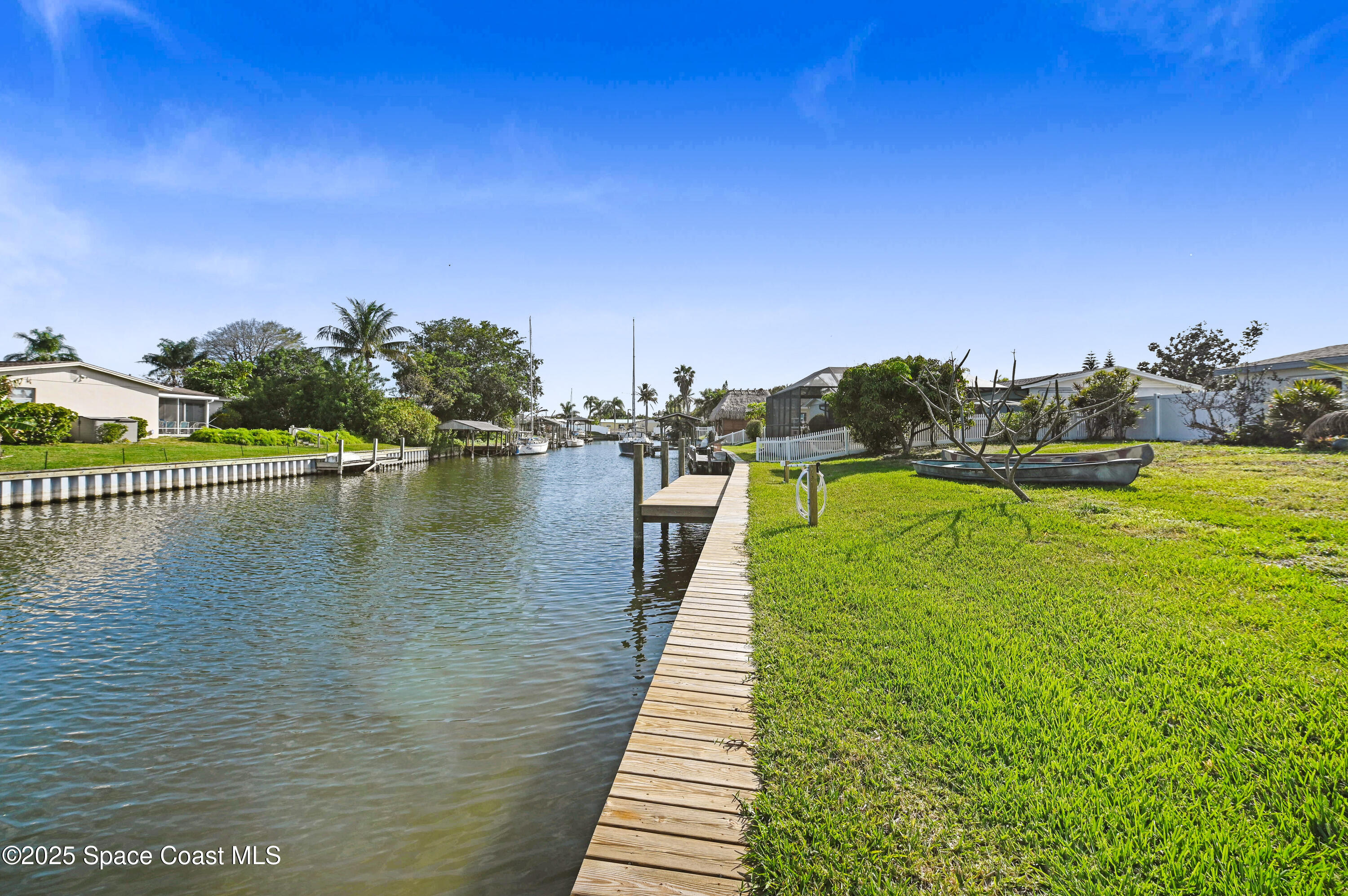 437 Eagle Drive Satellite Beach, FL 32937 - Photo 14 of 30 a lake view with a garden