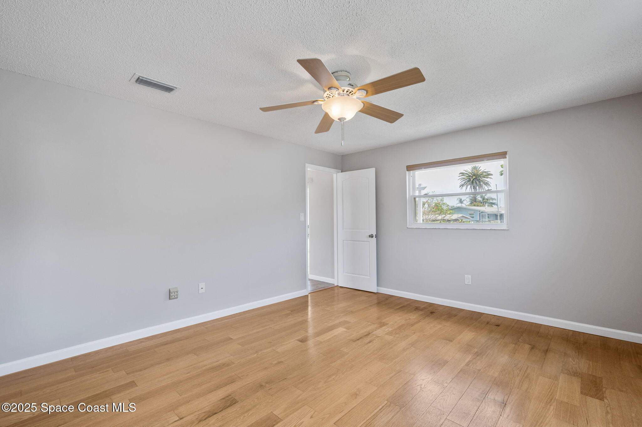 437 Eagle Drive Satellite Beach, FL 32937 - Photo 17 of 30 a view of an empty room