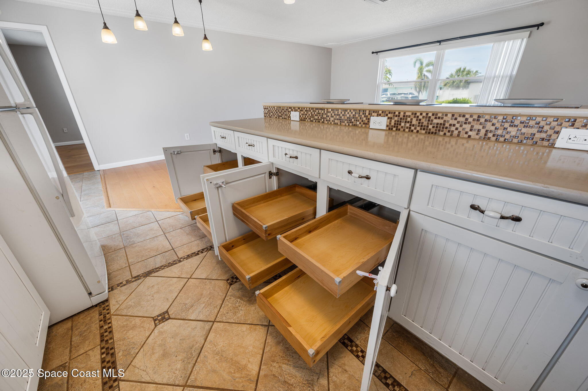 437 Eagle Drive Satellite Beach, FL 32937 - Photo 6 of 30 a room with storage and utility