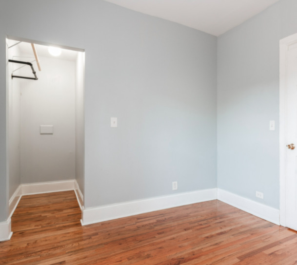 3614 West George Street, Unit 1R Chicago, IL 60618 - Photo 5 of 12 a view of room with wooden floor