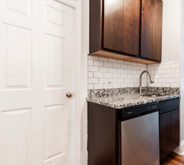 3614 West George Street, Unit 1R Chicago, IL 60618 - Photo 10 of 12 a kitchen with a sink and cabinets