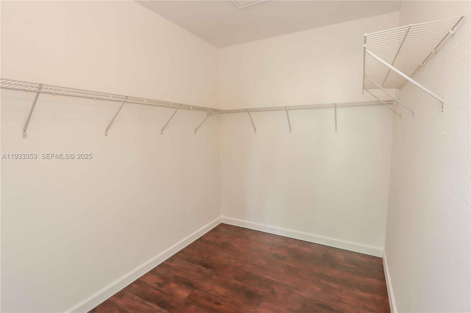 846 Southwest 148th Place Miami, FL 33194 - Photo 27 of 32 a view of a room with racks on the wall