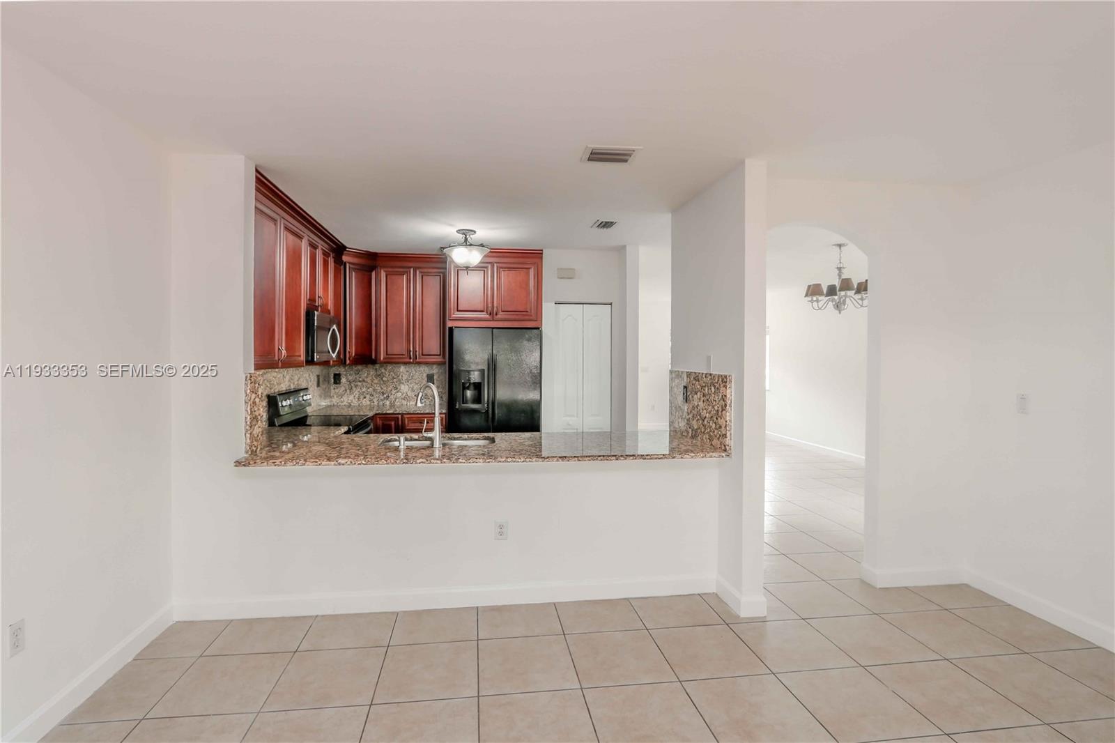 846 Southwest 148th Place Miami, FL 33194 - Photo 10 of 32 a view of a kitchen with a sink