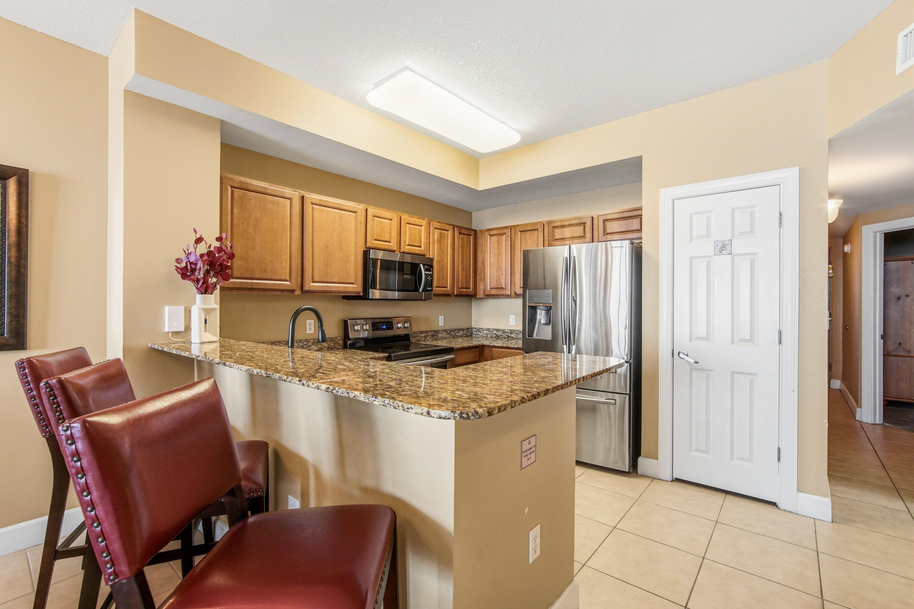 14825 Front Beach Road, Unit 2102 Panama City Beach, FL 32413 - Photo 8 of 38 Dining_to_Kitchen_ Unit 2102