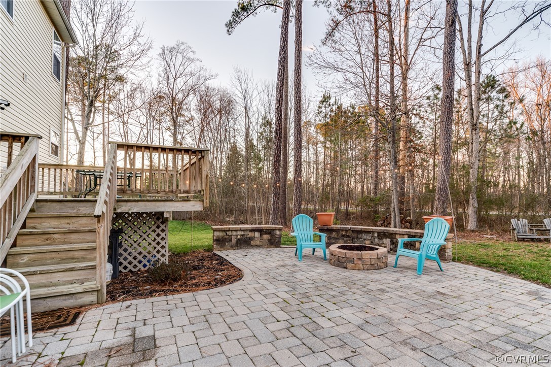14742 Clover Ridge Lane Chesterfield, VA 23832 - Photo 20 of 26 Custom patio and built-in firepit for fun nights a
