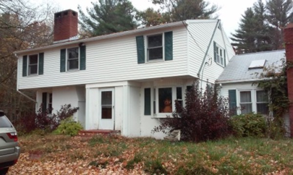 160 Draper Road East Brookfield, MA 01515 - Photo 3 of 19 a view of a house with a yard and plants