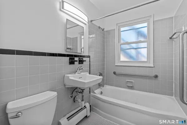an aerial view of a chairs and table on the deck