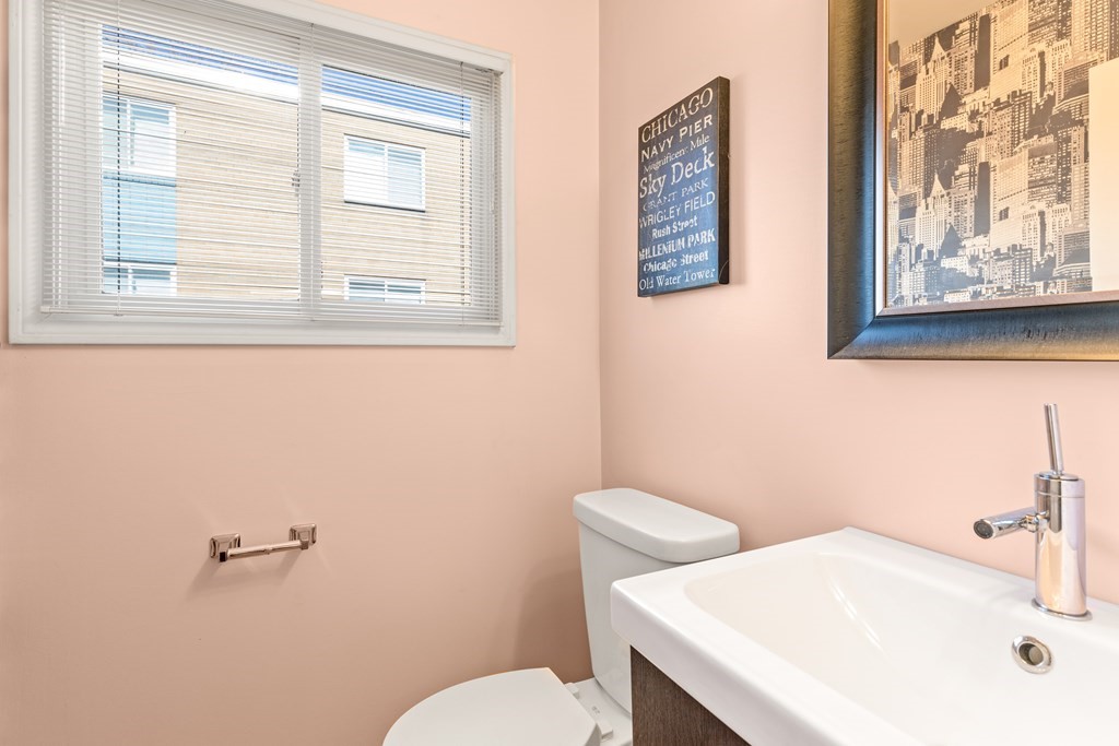 4873 Washington Street, Unit 1 Boston, MA 02132 - Photo 13 of 25 a bathroom with a sink and a toilet