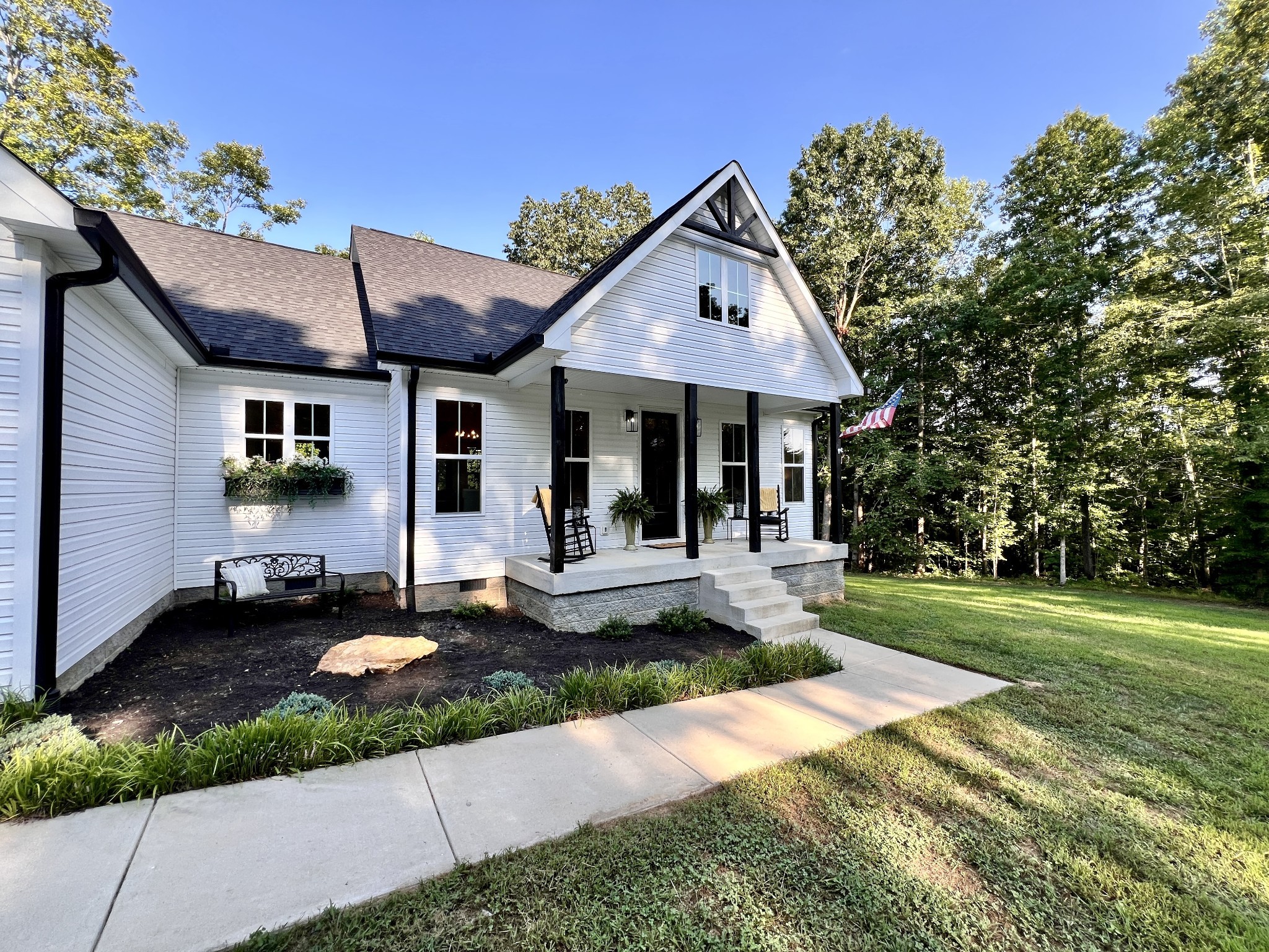 859 Lucas Road Dickson, TN 37055 - Photo 4 of 63 a front view of a house with garden