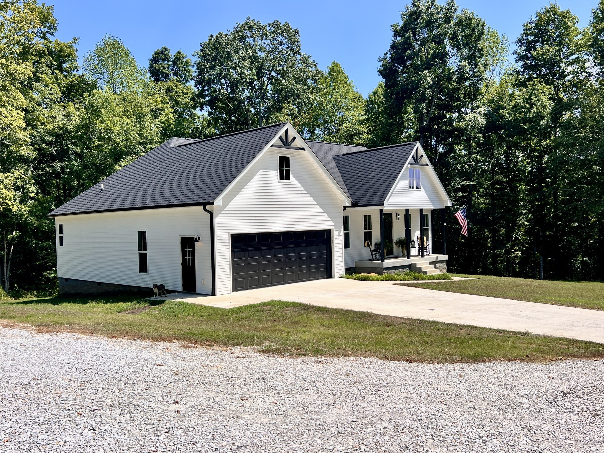 859 Lucas Road Dickson, TN 37055 - Photo 9 of 63 a front view of a house with a yard and garage