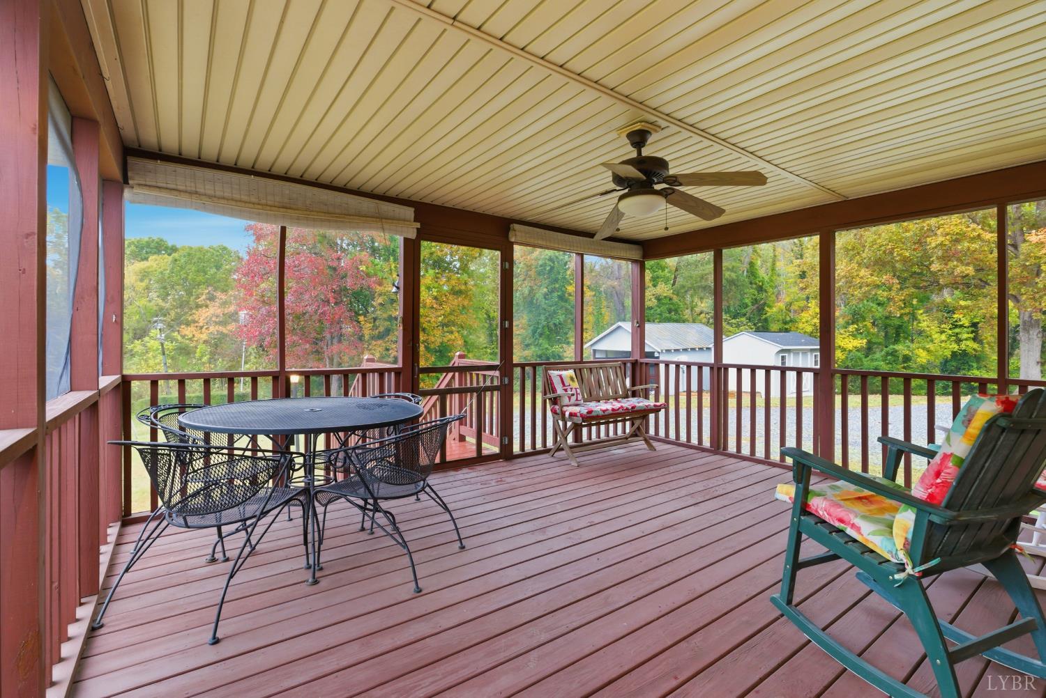1760 Wickliffe Road Brookneal, VA 24528 - Photo 28 of 40 a view of a patio with a table chairs and a barbeque