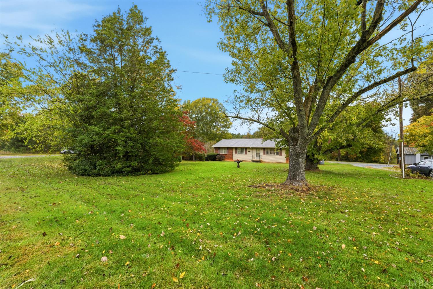 1760 Wickliffe Road Brookneal, VA 24528 - Photo 34 of 40 a view of a house with a yard