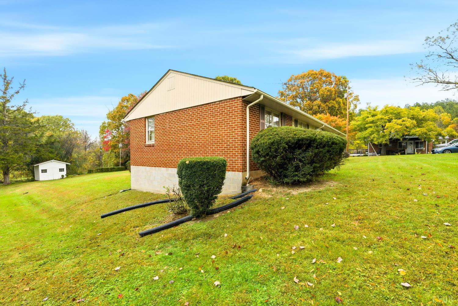1760 Wickliffe Road Brookneal, VA 24528 - Photo 37 of 40 a view of a back yard of the house