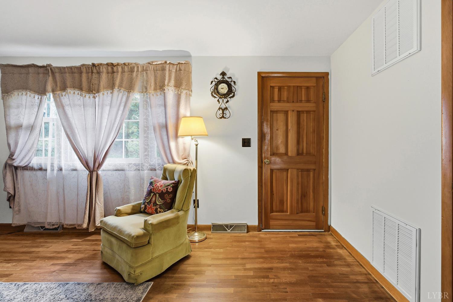 1760 Wickliffe Road Brookneal, VA 24528 - Photo 5 of 40 a living room with furniture and a wooden floor