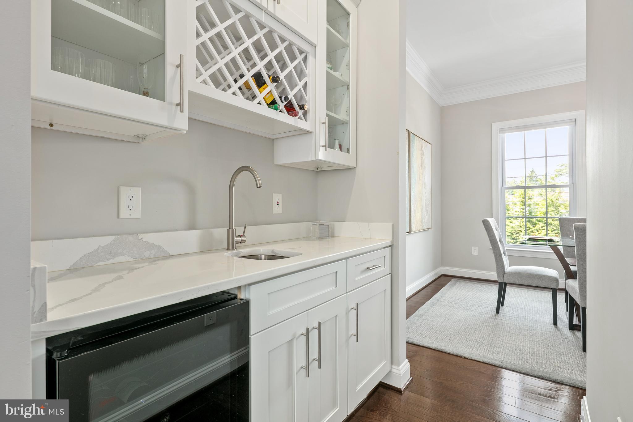 7911 Fort Hunt Road Alexandria, VA 22308 - Photo 18 of 71 Butler's hallway w/mini-fridge, sink, storage