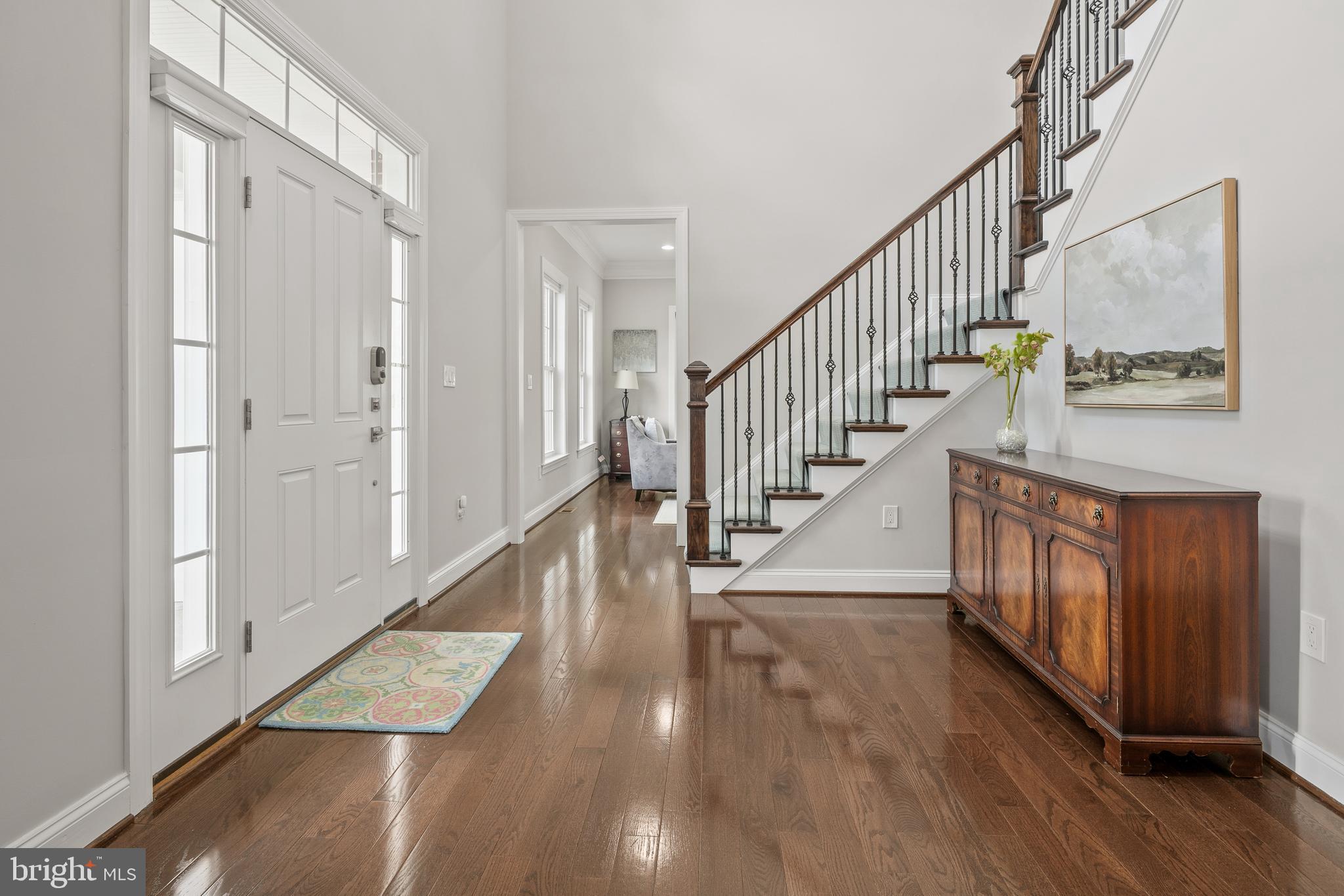 7911 Fort Hunt Road Alexandria, VA 22308 - Photo 6 of 71 Elegant foyer, stately staircase, lovely hardwoods
