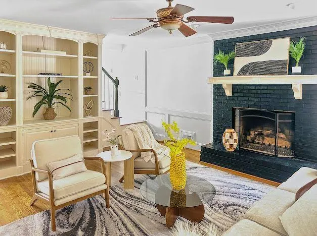 a living room with furniture and a fireplace