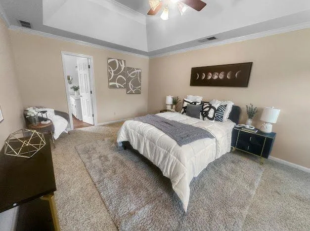 a spacious bathroom with a double vanity sink a large mirror and a bathtub