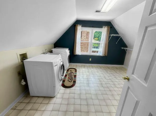 an empty room with fireplace