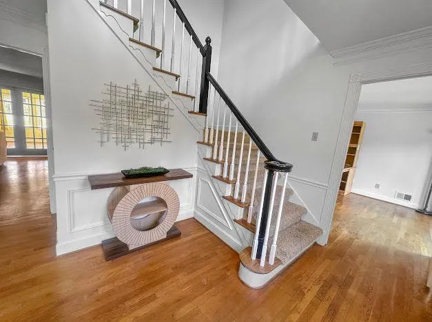 a view of entryway with wooden floor